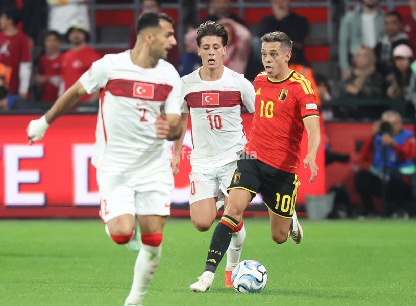 Turkey' Arda Guler and Belgium's Leandro Trossard fight for the ball during pictured during a soccer game between Belgian national team Red Devils and Turkey, on Friday 2 October 2026 in Liege, the third game of the UEFA Nations League group stage