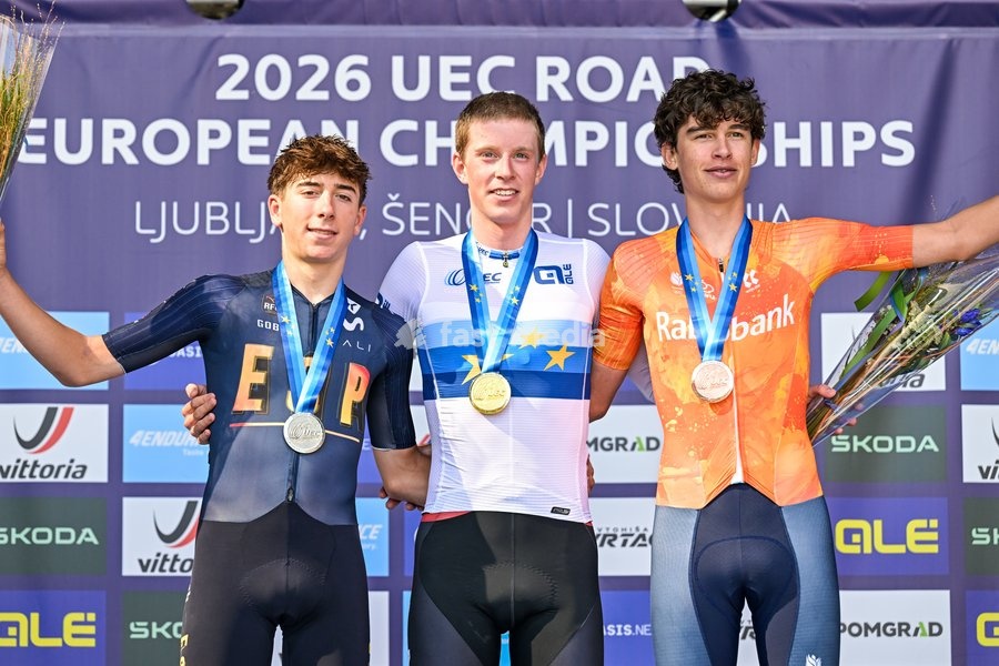 L-R, second Spain's Altor Martinez Groset, Winner European champion Norway's Elias Dybing, third Netherland's Jop Van Den Biggelaar celebrate on the podium of the Men juniors Road Race race (110,5 km) at the cycling UEC Road European Championships, in Ljubljana, Slovenia Saturday 3 October 2026.…