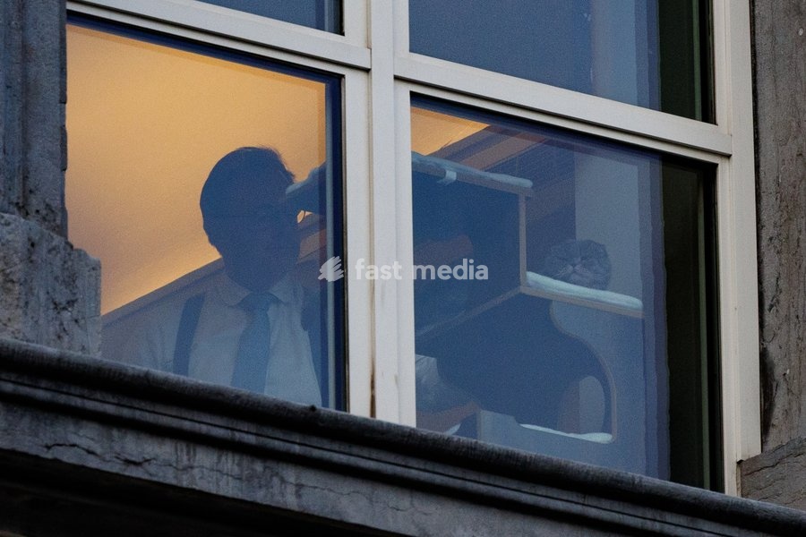 Prime Minister Bart De Wever and his cat pictured after a meeting of the Federal Government on the budget for 2027, Saturday 3 October 2026 in Brussels
