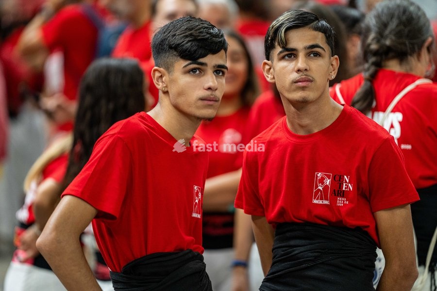 Members of Nens del Vendrell colla waits for her turn during the Concurs de Castells competition in Tarragona, Spain, on October 3, 2026