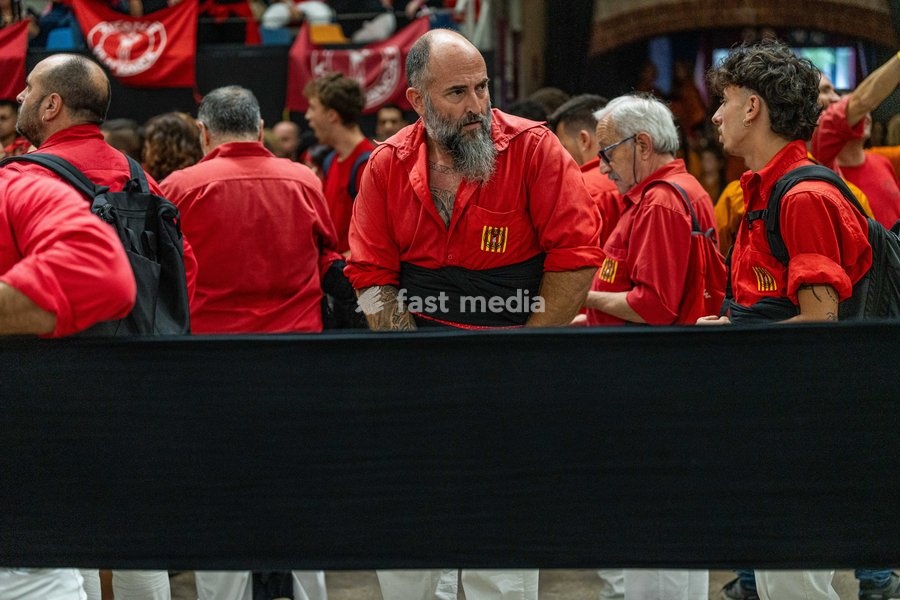 Members of the Xicots de Vilafranca colla prepare to take part in the Concurs de Castells competition in Tarragona, Spain, on October 3, 2026