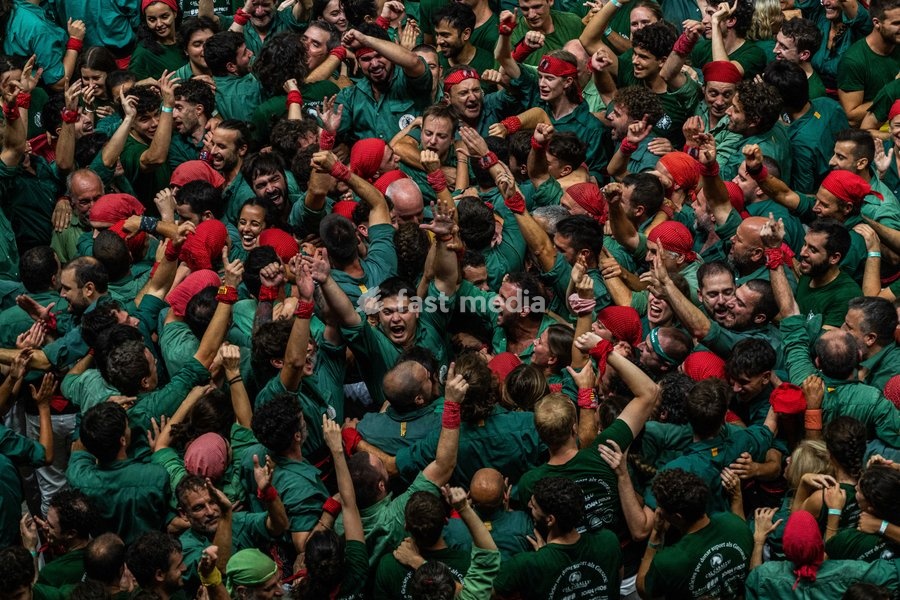 Members of the Sant Cugat colla celebrating during the Concurs de Castells competition in Tarragona, Spain, on October 3, 2026