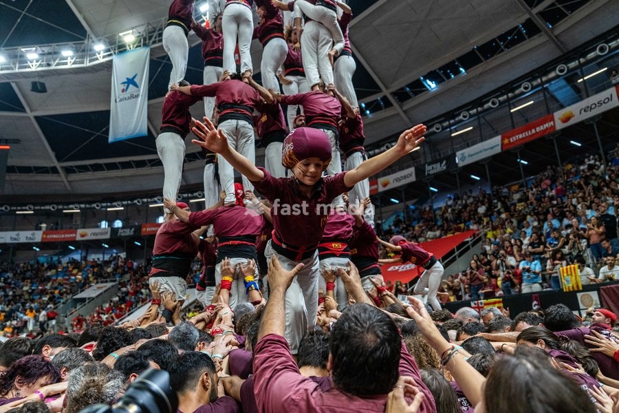 Members of the Xics de Granollers colla celebrating during the Concurs de Castells competition in Tarragona, Spain, on October 3, 2026