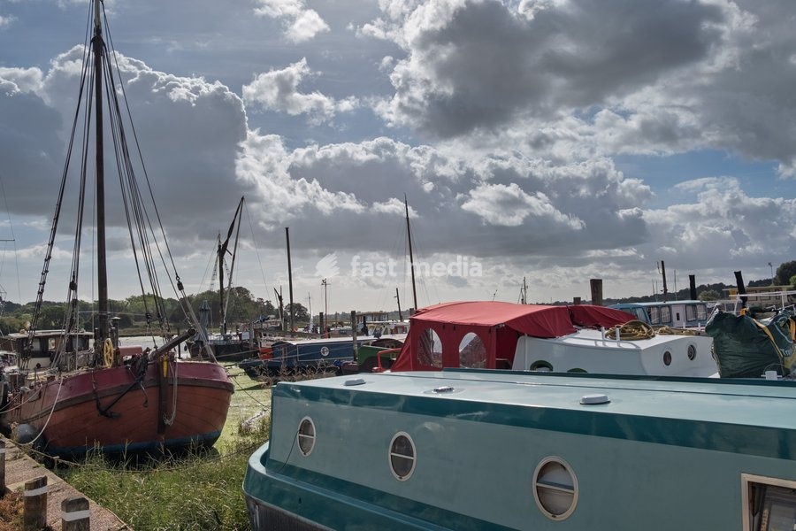 Boats by the quay at Woodbridge on the River Deben near Ipswich, Suffolk. United Kingdom. 02 October 2026