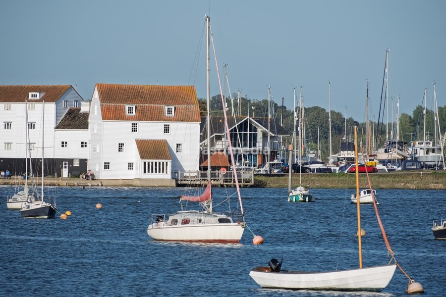 The Tide Mill, Woodbridge, one of only a handful in the world still producing flour on a regular basis and among the first tide mills in the country, working on the same site for over 850 years. Boats at Woodbridge on the River Deben near Ipswich, Suffolk. United Kingdom. 02 October 2026