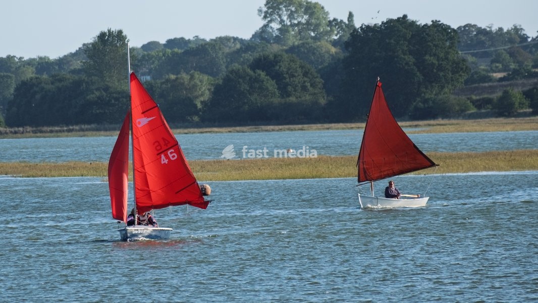 Small dingy boats being sailed back into Woodbridge. Woodbridge on the River Deben near Ipswich, Suffolk. United Kingdom. 02 October 2026