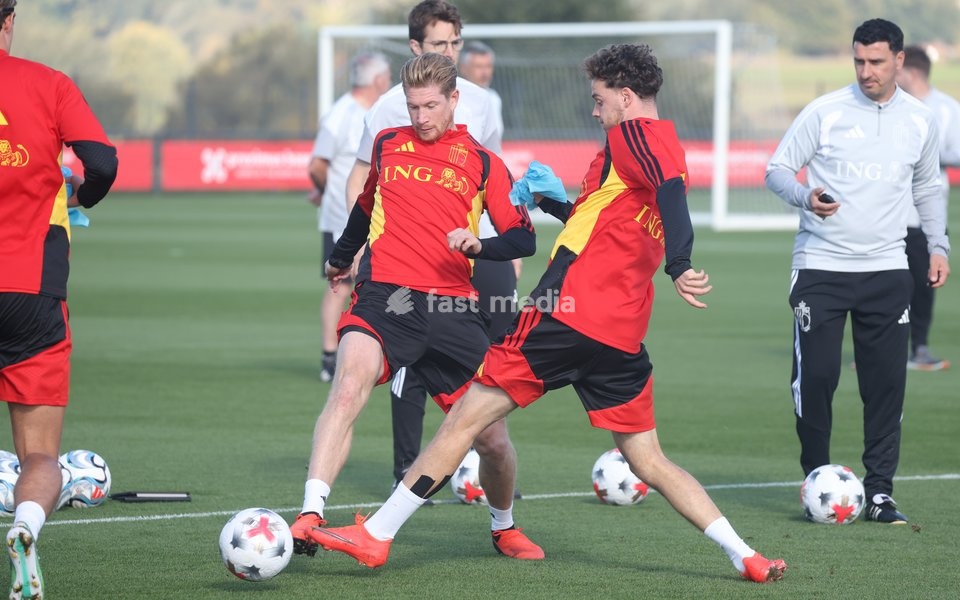 Belgium's Kevin De Bruyne and Belgium's Maxim De Cuyper fight for the ball during a training session of the Red Devils, the Belgian national soccer team, at the national training center in Tubize, Sunday 4 October 2026. The team is preparing for their game against France on Monday, their fourth…