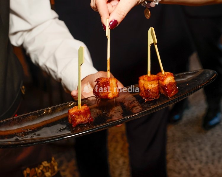 Pork Belly Skewers with illy espresso maple syrup glaze at the The Leopard Bar Launch Party at The Rubens at the Palace