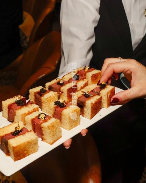 Steak Sandwiches with caviar and gold leaf at the The Leopard Bar Launch Party at The Rubens at the Palace