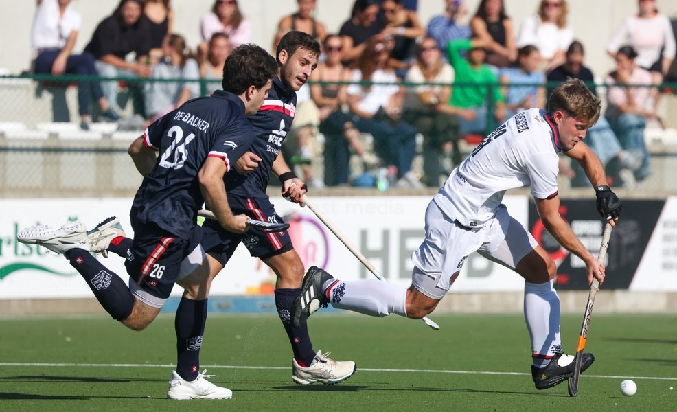 Leopold's Dylan Englebert and Dragon’s Victor Wegnez fight for the ball during a hockey game between Royal Leopold Club and KHC Dragons on Sunday 4 October 2026 in Brussels, on day 4 of the Belgian first division hockey championship