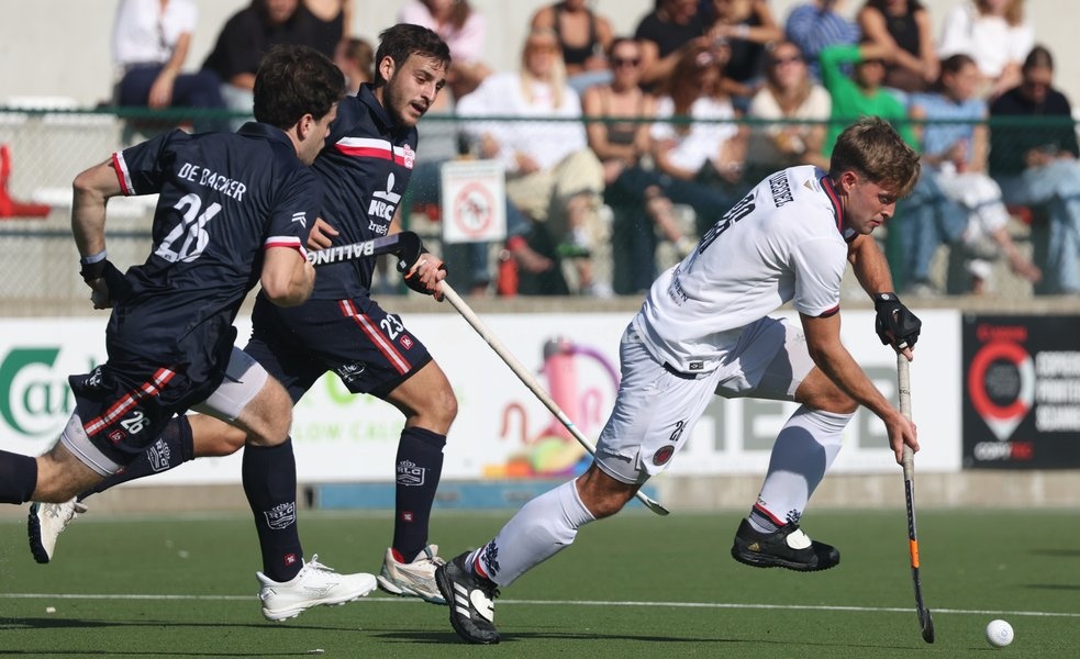 Leopold's Dylan Englebert and Dragon’s Victor Wegnez fight for the ball during a hockey game between Royal Leopold Club and KHC Dragons on Sunday 4 October 2026 in Brussels, on day 4 of the Belgian first division hockey championship