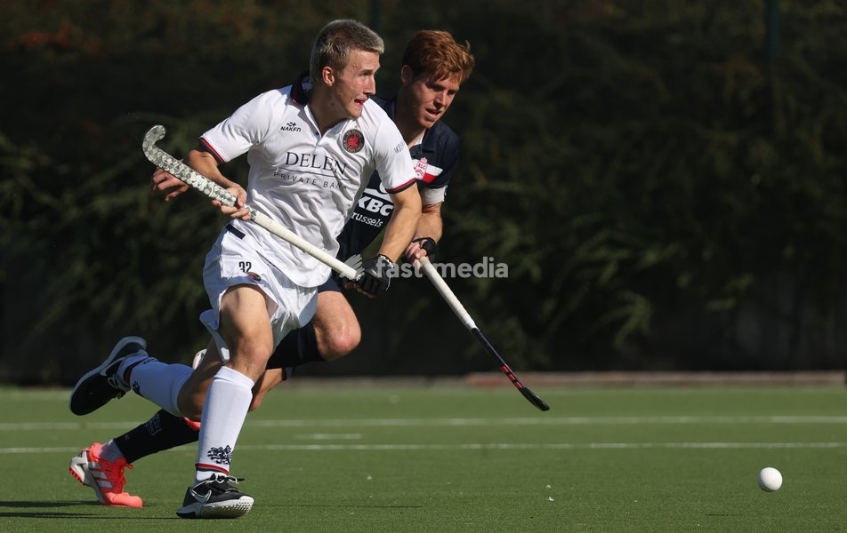 Dragon’s Gearge Baker and Leopold's Gauthier Boccard fight for the ball during a hockey game between Royal Leopold Club and KHC Dragons on Sunday 4 October 2026 in Brussels, on day 4 of the Belgian first division hockey championship