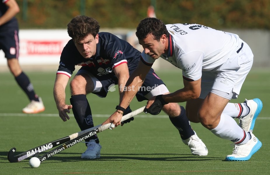 Leopold's Louis de Backer and Dragon’s Pepe Cunill fight for the ball during a hockey game between Royal Leopold Club and KHC Dragons on Sunday 4 October 2026 in Brussels, on day 4 of the Belgian first division hockey championship