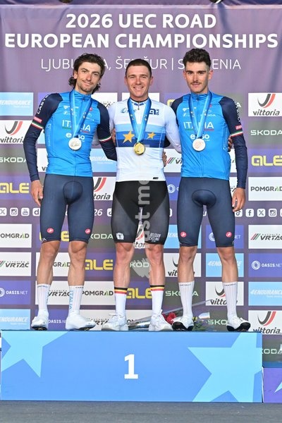 Italy's Giulio Ciccone; Belgium's Remco Evenepoel and Italy's Christian Scaroni celebrate on the podium after the elite men Road Race race (196,2 km) at the cycling UEC Road European Championships, in Ljubljana, Slovenia Sunday 4 October 2026. The UEC Road European Championships are taking place…