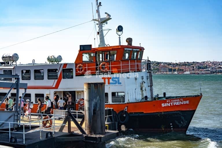 Passenger ferry docking at Cacilhas on the Tagus River, connecting Lisbon and Almada, an essential part of the city’s daily transport system