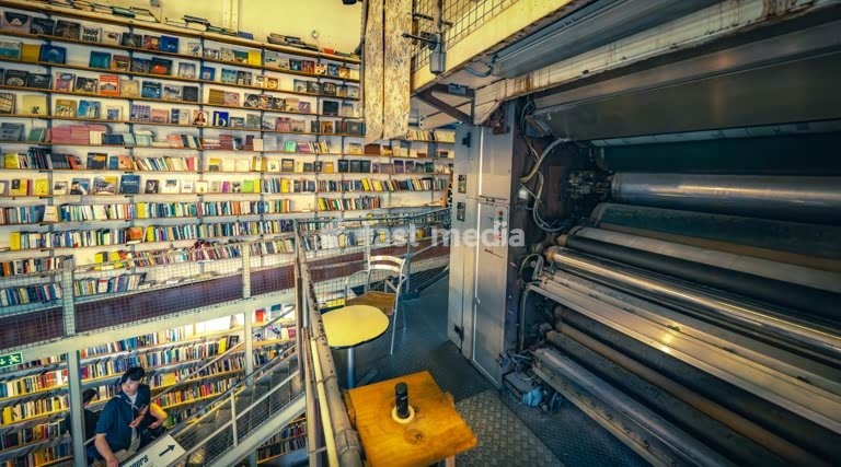 Bookstore Ler Devagar in Lisbon’s LX Factory, a former newspaper print factory, now cultural hotspot, with books, vinyl records, historic machinery