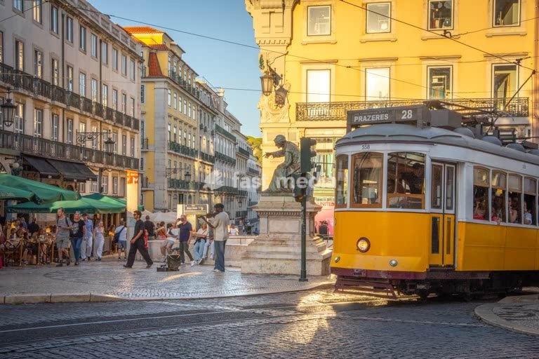 Historic Tram 28 passes Rua Garrett in Chiado, Lisbon, Portugal