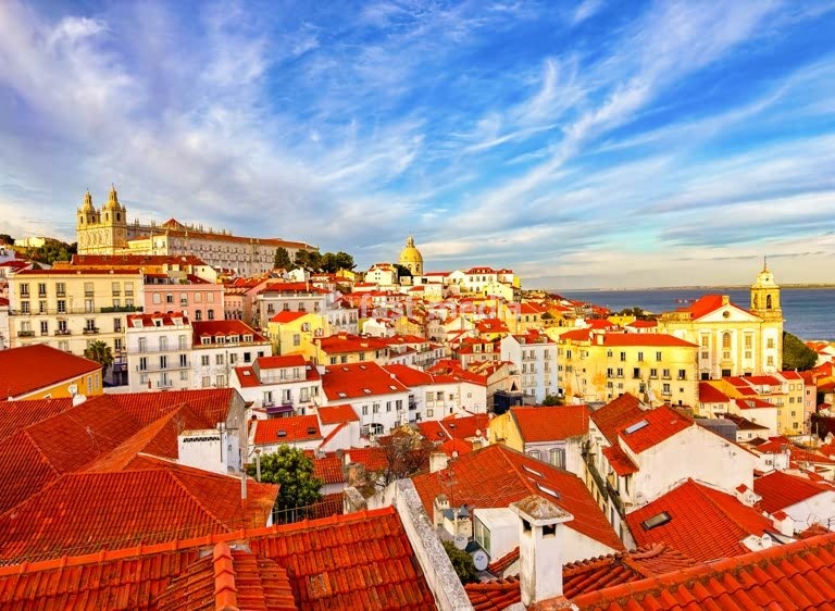 Lisbon, Portugal – view over the red rooftops of Alfama with São Vicente de Fora and the National Pantheon