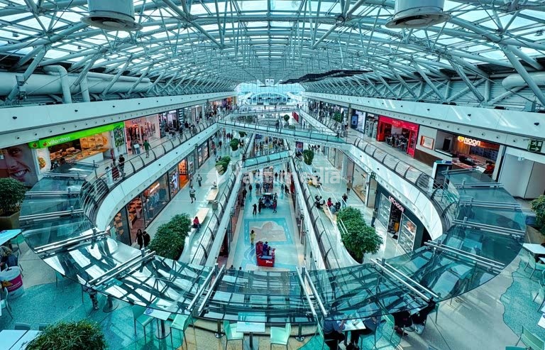 Oriente shopping mall atrium, modern steel glass architecture, escalators and canopy, Parque das Nações, Lisbon, Portugal