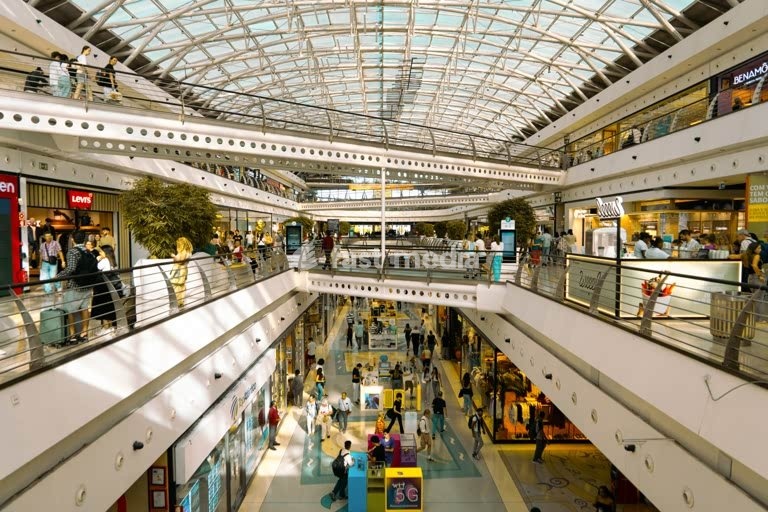 Oriente shopping mall atrium, modern steel glass architecture, escalators and canopy, Parque das Nações, Lisbon, Portugal