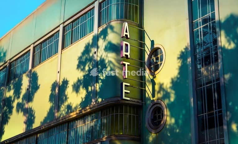 Cinearte Art Deco theatre facade with ARTE neon sign, Largo de Santos, Lisbon