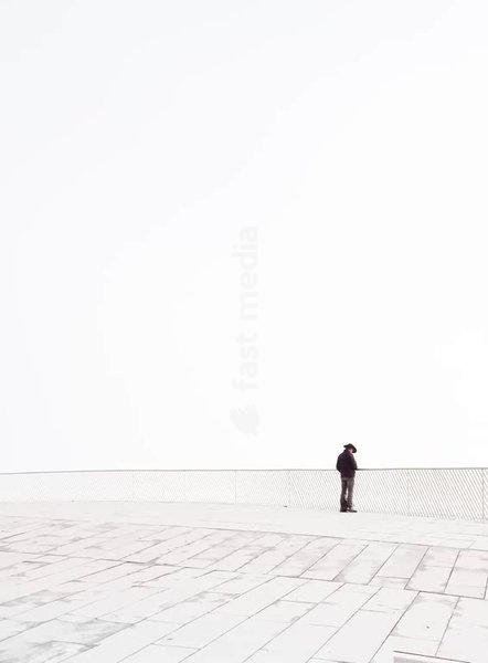 Solitary figure on MAAT Museum rooftop, Lisbon Belem Portugal – minimalist emptiness and philosophical mood on a foggy day