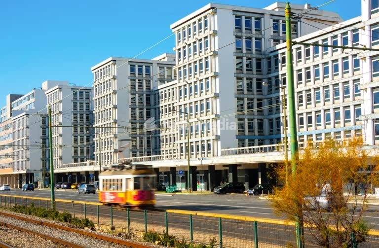 Avenida 24 de Julho, Lisbon, modernist office block, and historic yellow tram