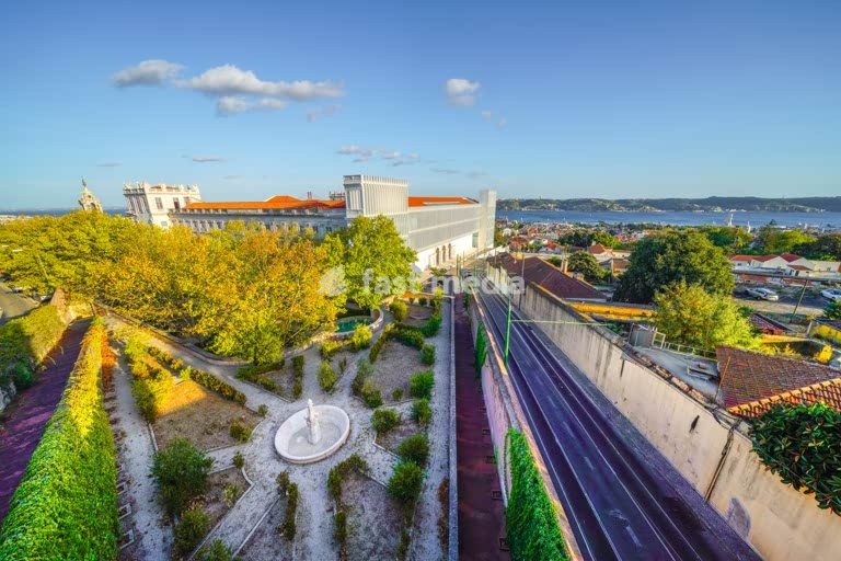 Secret Lisbon: Ajuda Palace (Palacio National da Ajuda) overlooking residential neighborhood Ajuda and Belém and Tagus river, Lisbon, Portugal