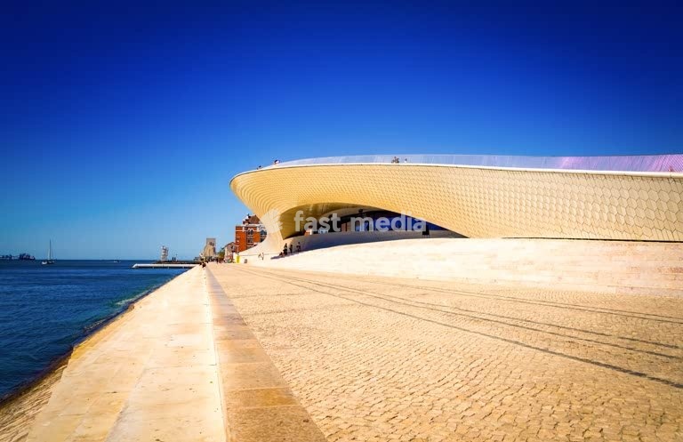 MAAT Museum curved facade, by Tagus River Lisbon Portugal – modern architecture