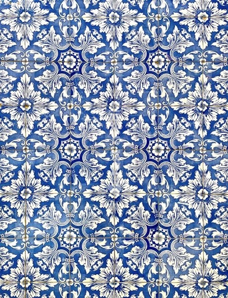 Traditional blue Portuguese azulejo tiles with geometric pattern, vintage ceramic wall decoration Portugal
