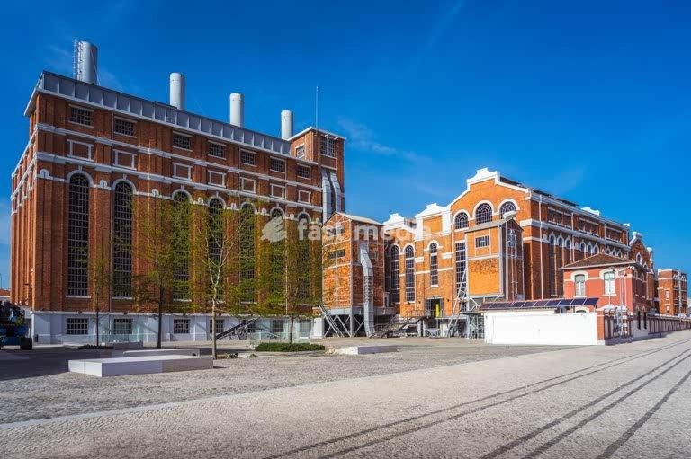 Museu da Eletricidade EDP (Electricity Museum), red-brick power station with tall chimneys, Belém, Lisbon, industrial heritage landmark