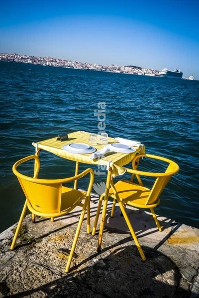Secret Lisbon: Ponto Final restaurant terrace, Tagus waterfront and 25 de Abril Bridge, Cacilhas, Almada, Lisbon, Portugal