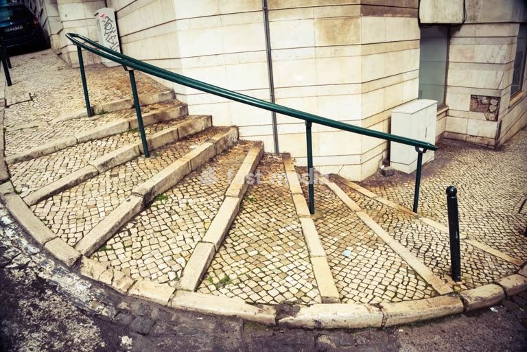 Calçada Portuguesa hillside stairway and granite kerbs, Lapa, Lisbon, Portugal