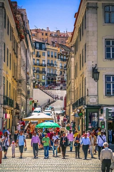 Lisbon, Portugal. Clacada do Carmo seen from Praca de Rossio. The stairs lead up to the Bairro Alto district