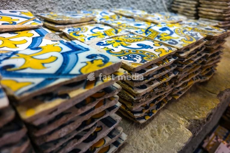 Lisbon. Antique tiles (azuleijos) in a shop in Principe Real