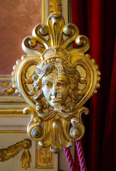 Lisbon. Ajuda Palace, mask alluding to the sun king Louis XIV