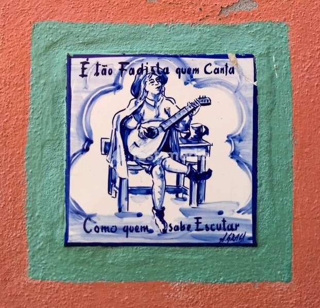 Lisbon. Typical Portuguese tiles (Azulejos) showing a fado singer