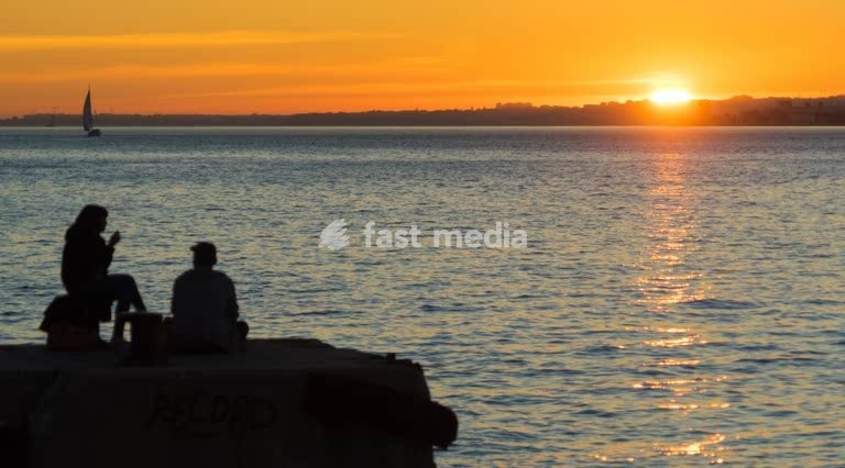 Lisbon, sunset over river Tagus