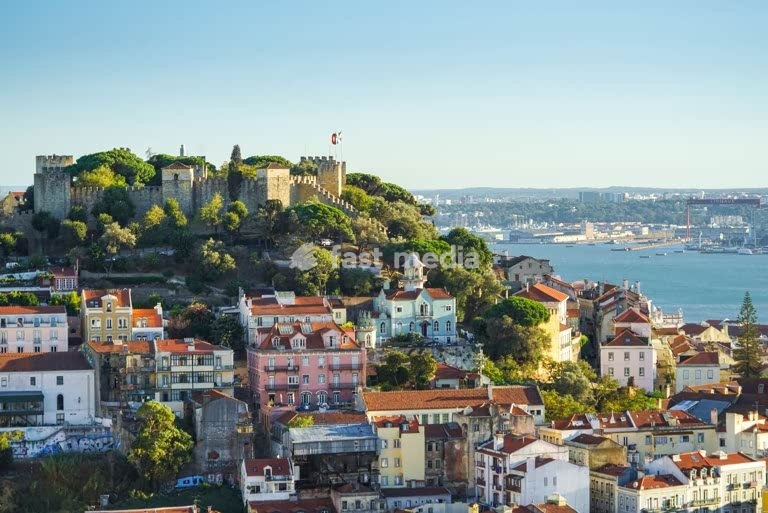 São Jorge Castle overlooking Alfama rooftops and the Tagus, Lisbon, Portugal