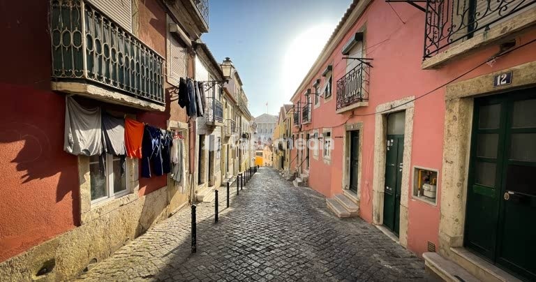 Lisbon, Portugal, street in the old part of town. Portugal's parliament in the background