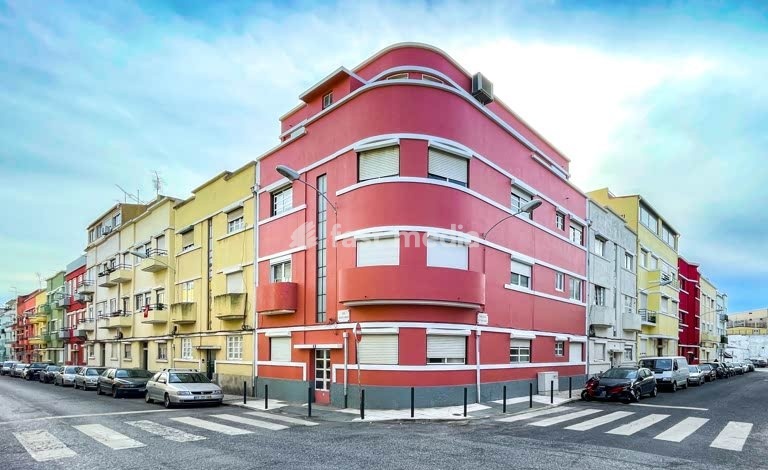 Lisbon, Portugal. Rounded corner house in Lisbon’s Boa-Hora district. Architecture style of Estado Novo.