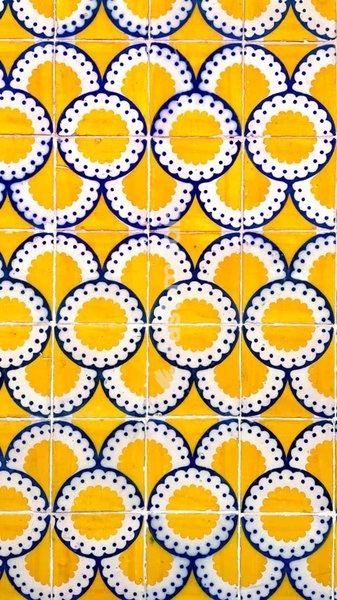 Traditional Portuguese azulejo tiles with geometric pattern, vintage ceramic wall decoration Portugal