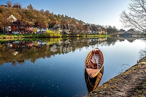 Traditional punt boat on the Neckar River in Tübingen on a beautiful spring morning