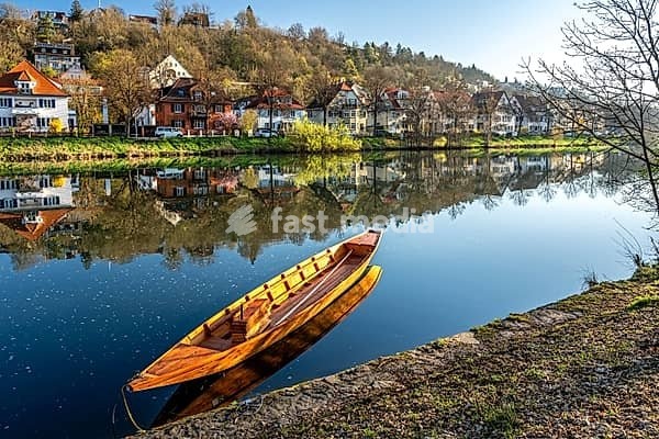 Traditional punt boat on the Neckar River in Tübingen on a clear spring morning