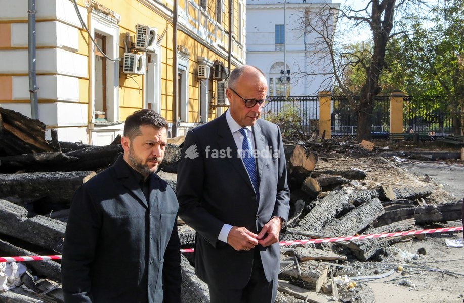 Ukrainian President Volodymyr Zelenskyy (L) and German Federal Chancellor Friedrich Merz, who arrived in the capital on a visit, speak to the media near the National Academy of Sciences of Ukraine building damaged by a Russian drone strike, Kyiv, Ukraine, on October 4, 2026. On September 28, a…