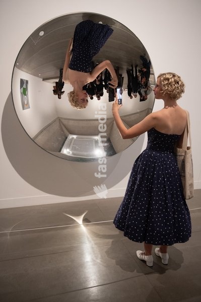 Visitors view 'Inverse Reverse Perverse' by Cerith Wyn Evans at a Photocall for 'The 90s: Art And Fashion' which runs from 8th October 2026 - 14th February 2027 at TATE Britain in London, England, UK on Tuesday 6 October, 2026