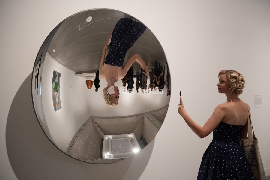 Visitors view 'Inverse Reverse Perverse' by Cerith Wyn Evans at a Photocall for 'The 90s: Art And Fashion' which runs from 8th October 2026 - 14th February 2027 at TATE Britain in London, England, UK on Tuesday 6 October, 2026