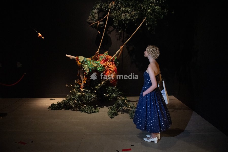 Visitors view 'The Swing (after Fragonard') by Yinka Shonibare at a Photocall for 'The 90s: Art And Fashion' which runs from 8th October 2026 - 14th February 2027 at TATE Britain in London, England, UK on Tuesday 6 October, 2026