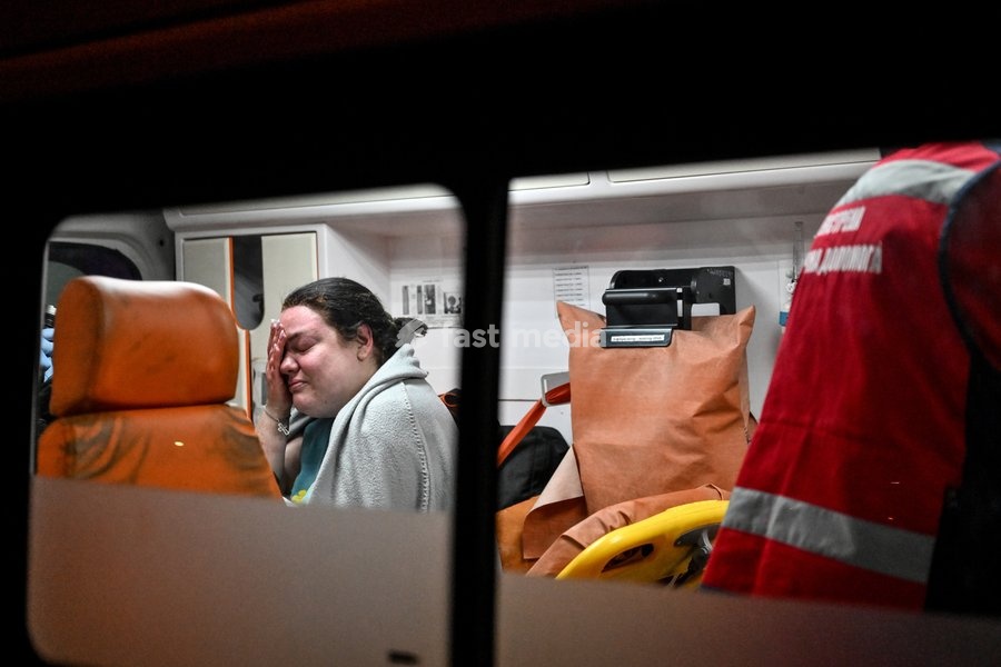 A woman who suffered burns in a Russian strike on a nine-story residential building receives medical treatment in an ambulance in the Kosmichnyi district of Zaporizhzhia, Ukraine, on October 5, 2026. Five people were injured in the Russian attack, one of them seriously. Rescuers evacuated three…