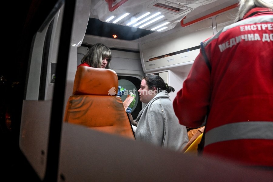 A woman who suffered burns in a Russian strike on a nine-story residential building receives medical treatment in an ambulance in the Kosmichnyi district of Zaporizhzhia, Ukraine, on October 5, 2026. Five people were injured in the Russian attack, one of them seriously. Rescuers evacuated three…